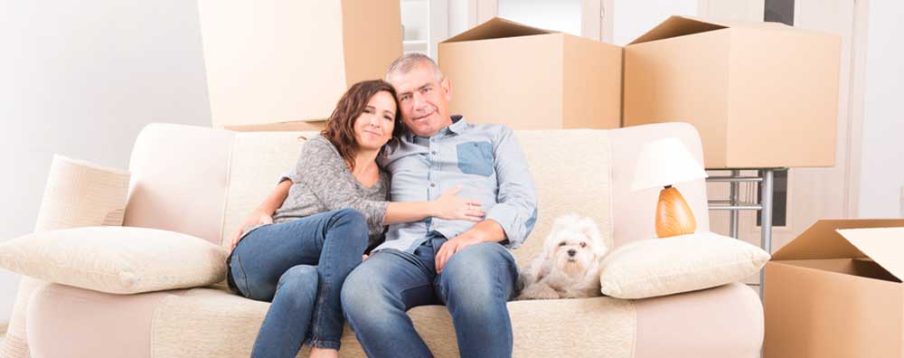 Couple sitting in new home